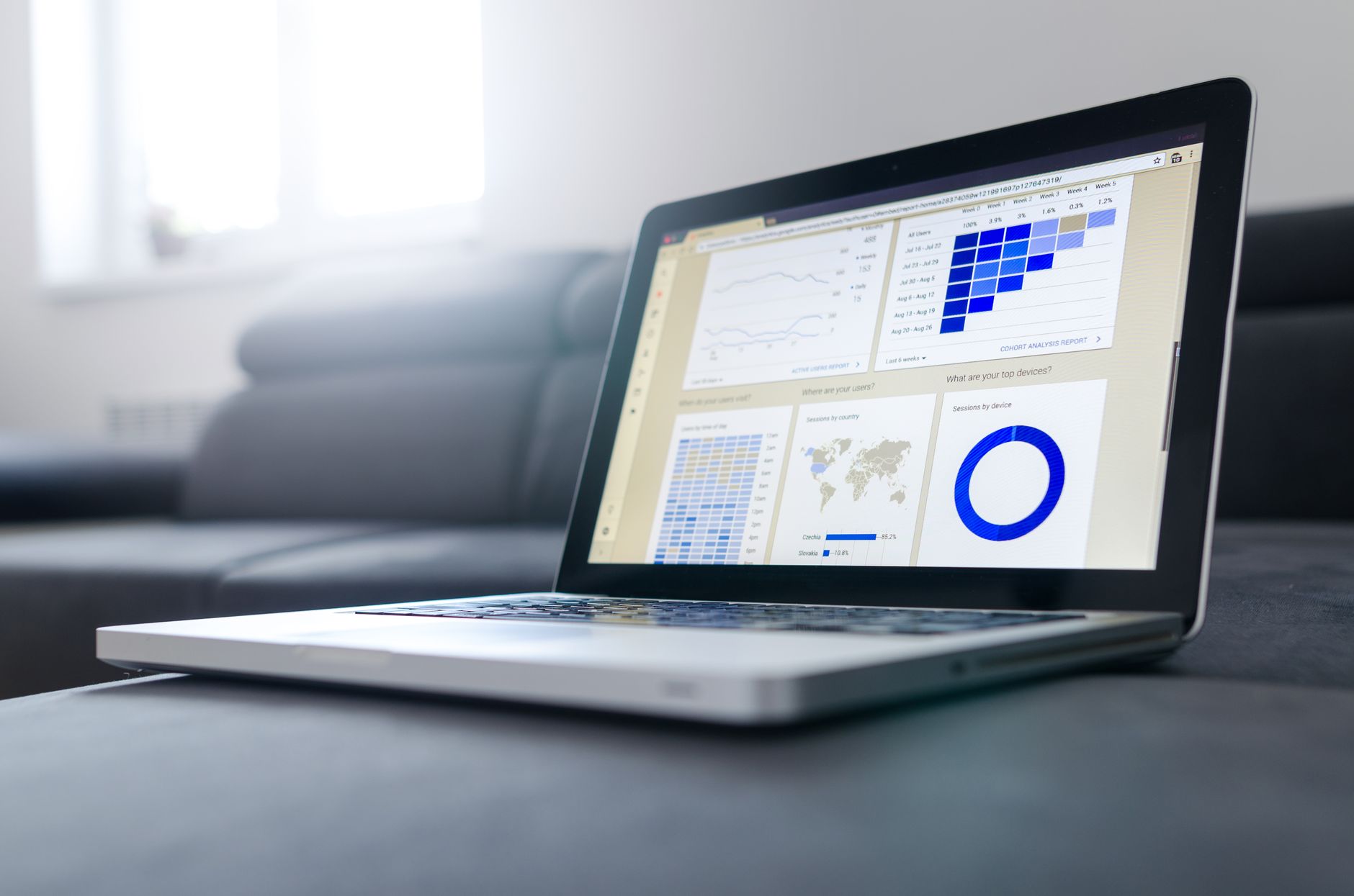 Marketer comparing A/B testing tools for agencies on a laptop dashboard