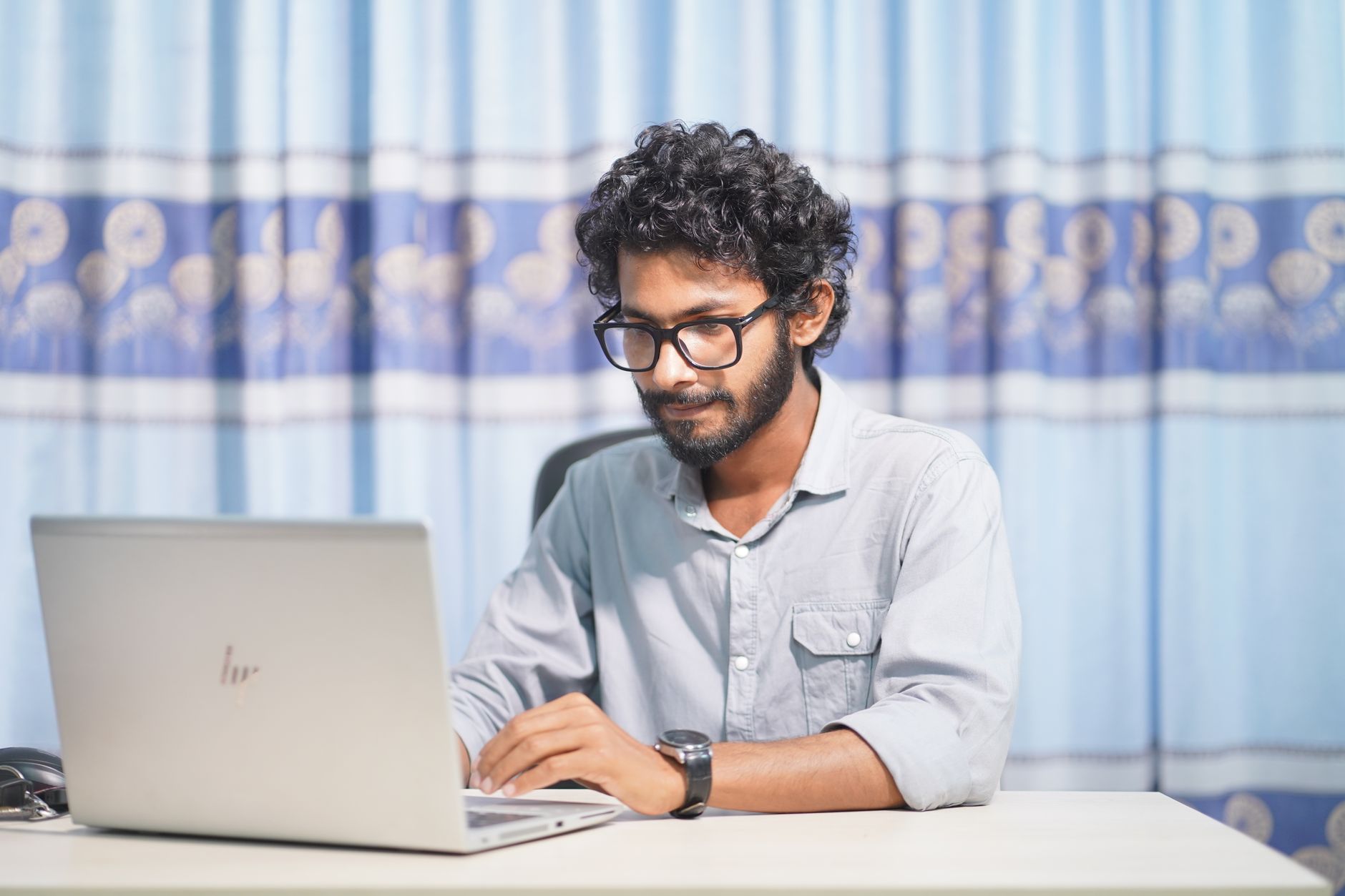 Designer editing a landing page for agency conversion rate optimization
